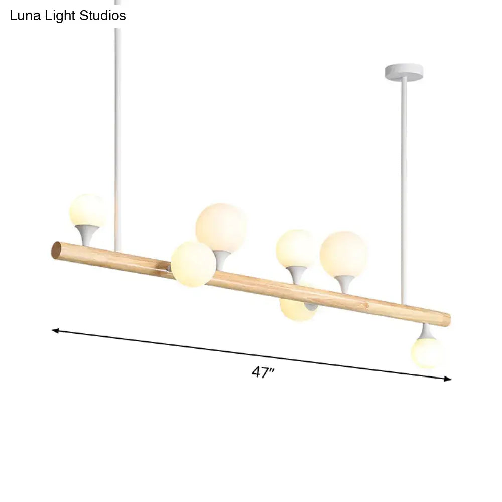 Modern wood island lamp with five globe lights dining room