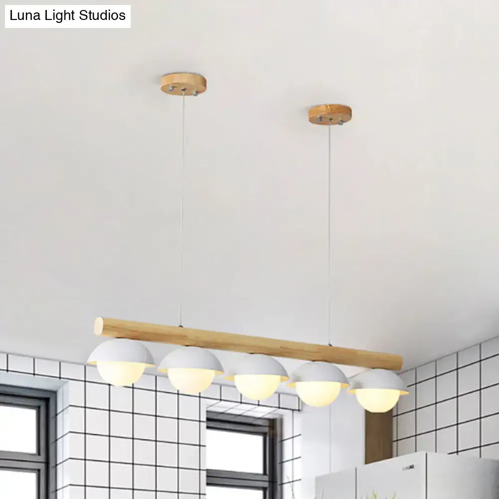 Modern wood stem linear chandelier with white shade dining room light