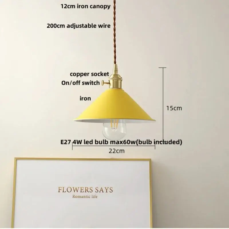 Modern yellow conical pendant light with copper knob for kitchens