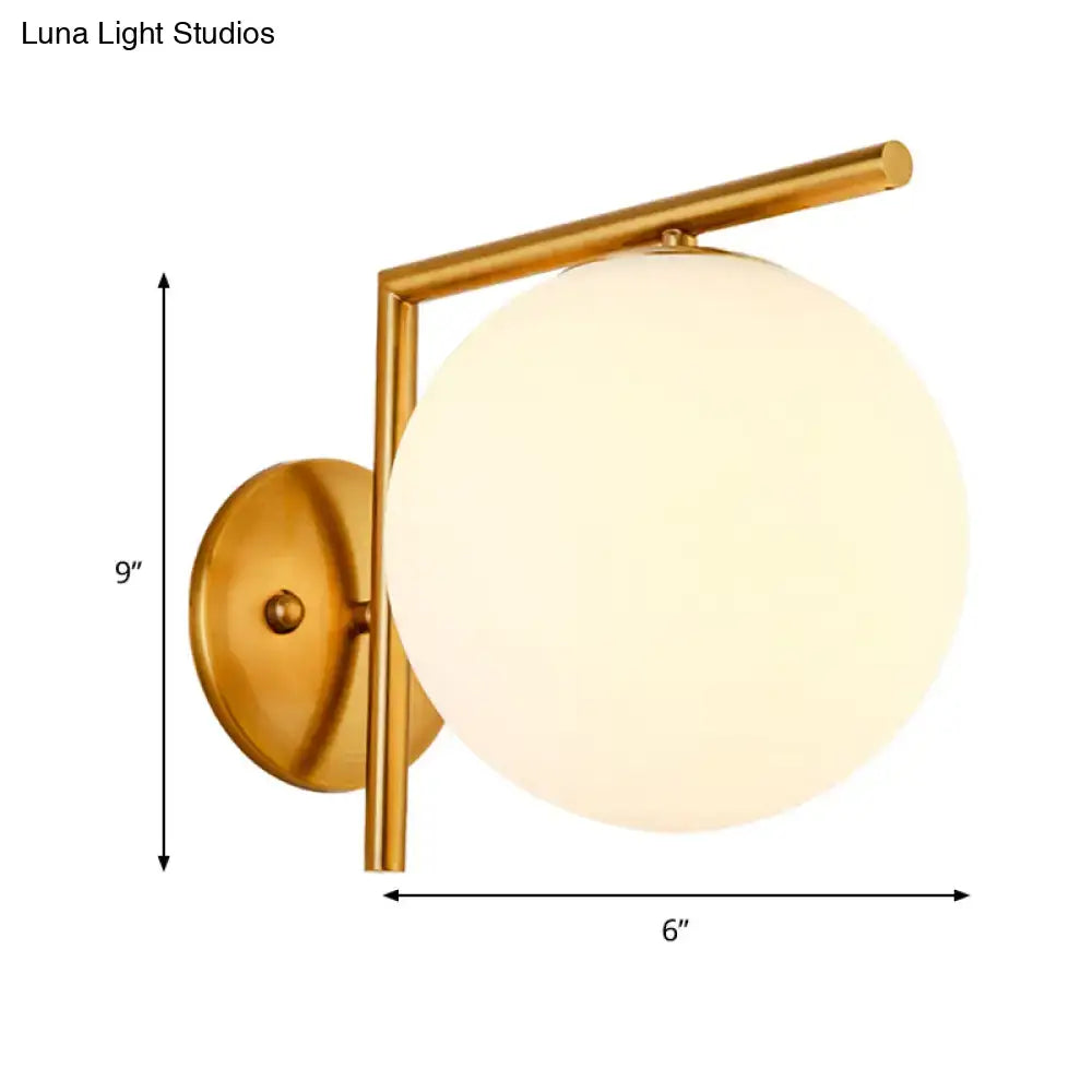 Modernist gold and white globe sconce light – bedroom wall lamp