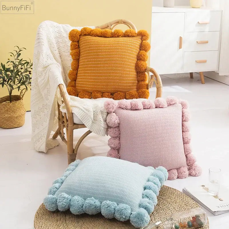 Orange textured ball cushion cover with pompoms living room decor