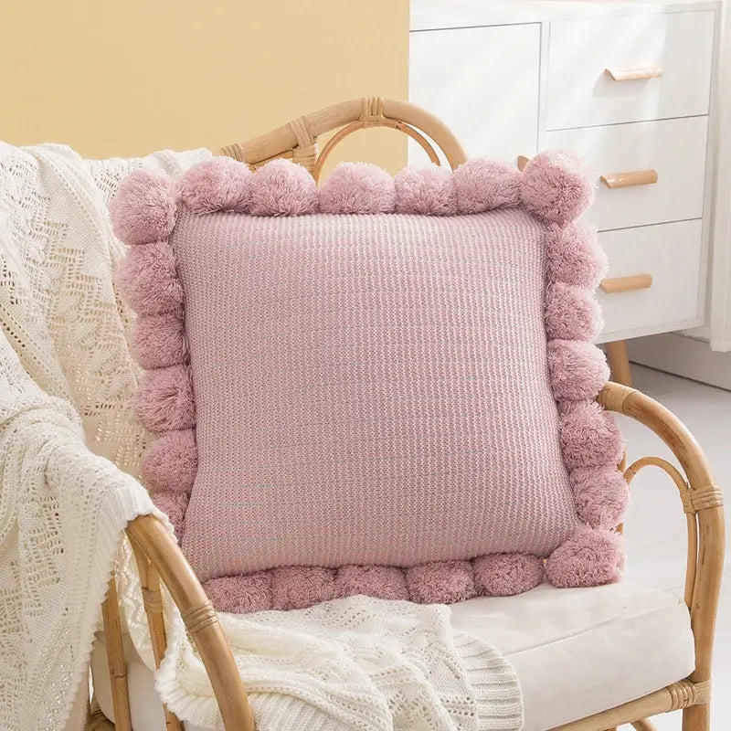 Orange textured ball cushion cover with pompoms living room decor
