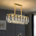 Ornate gold crystal leaf pendant light for bedroom