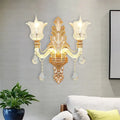 Ornate gold floral wall lamp with clear crystal glass bedroom sconce