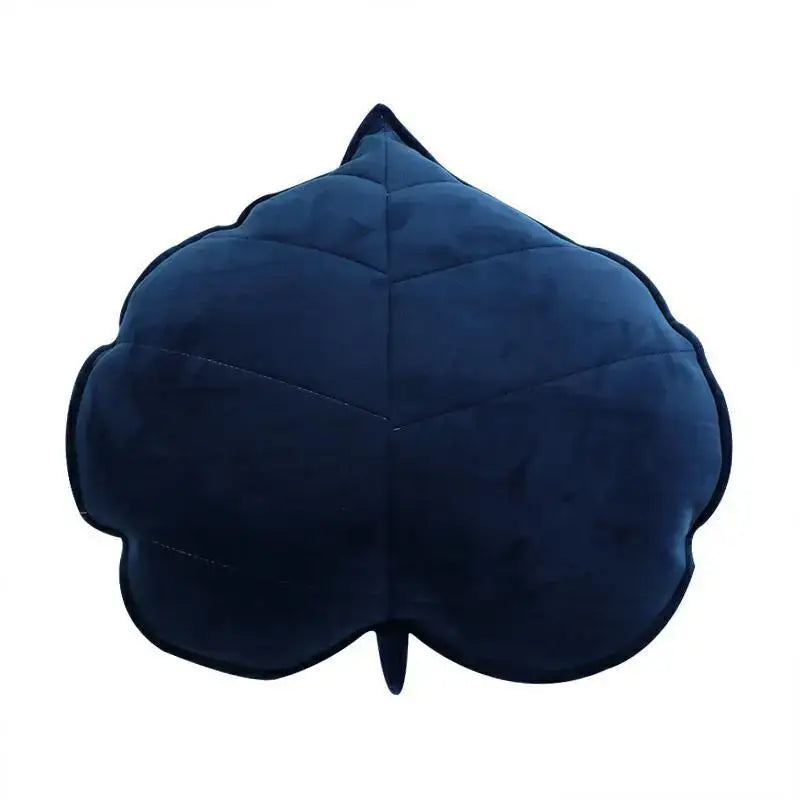 Plush leaf shaped throw pillows in sage and mustard for living room