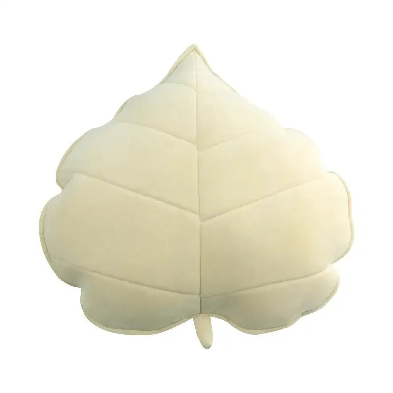 Plush leaf shaped throw pillows in sage and mustard for living room
