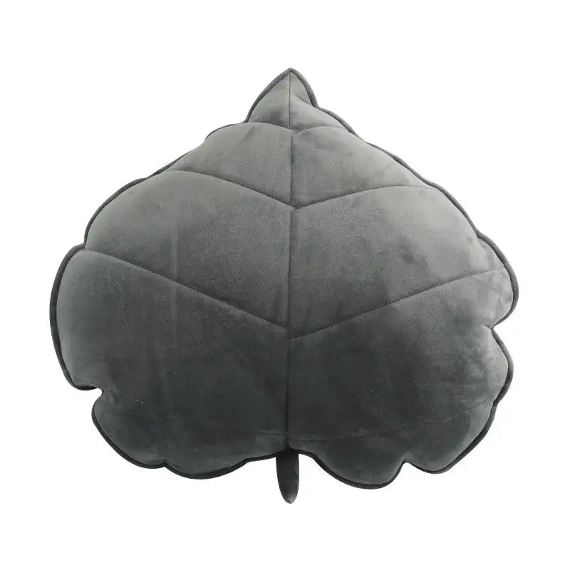 Plush leaf shaped throw pillows in sage and mustard for living room