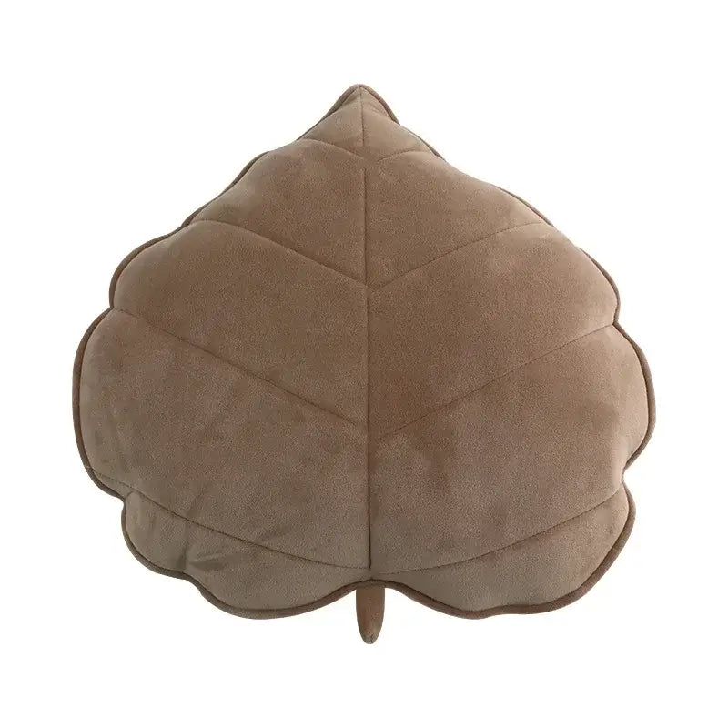 Plush leaf shaped throw pillows in sage and mustard for living room