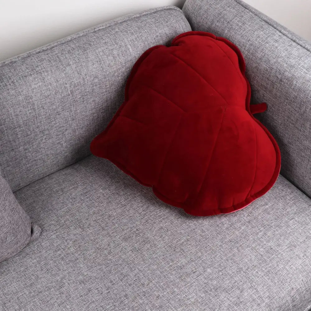 Plush leaf shaped throw pillows in sage and mustard for living room