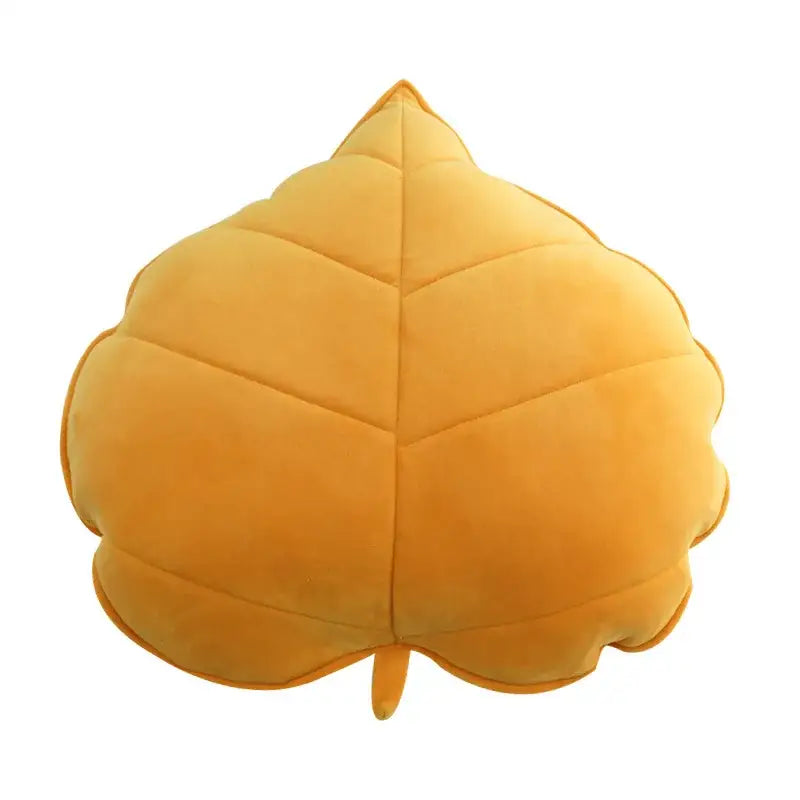 Plush leaf shaped throw pillows in sage and mustard for living room