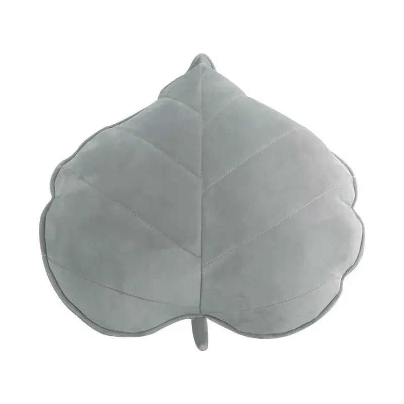 Plush leaf shaped throw pillows in sage and mustard for living room