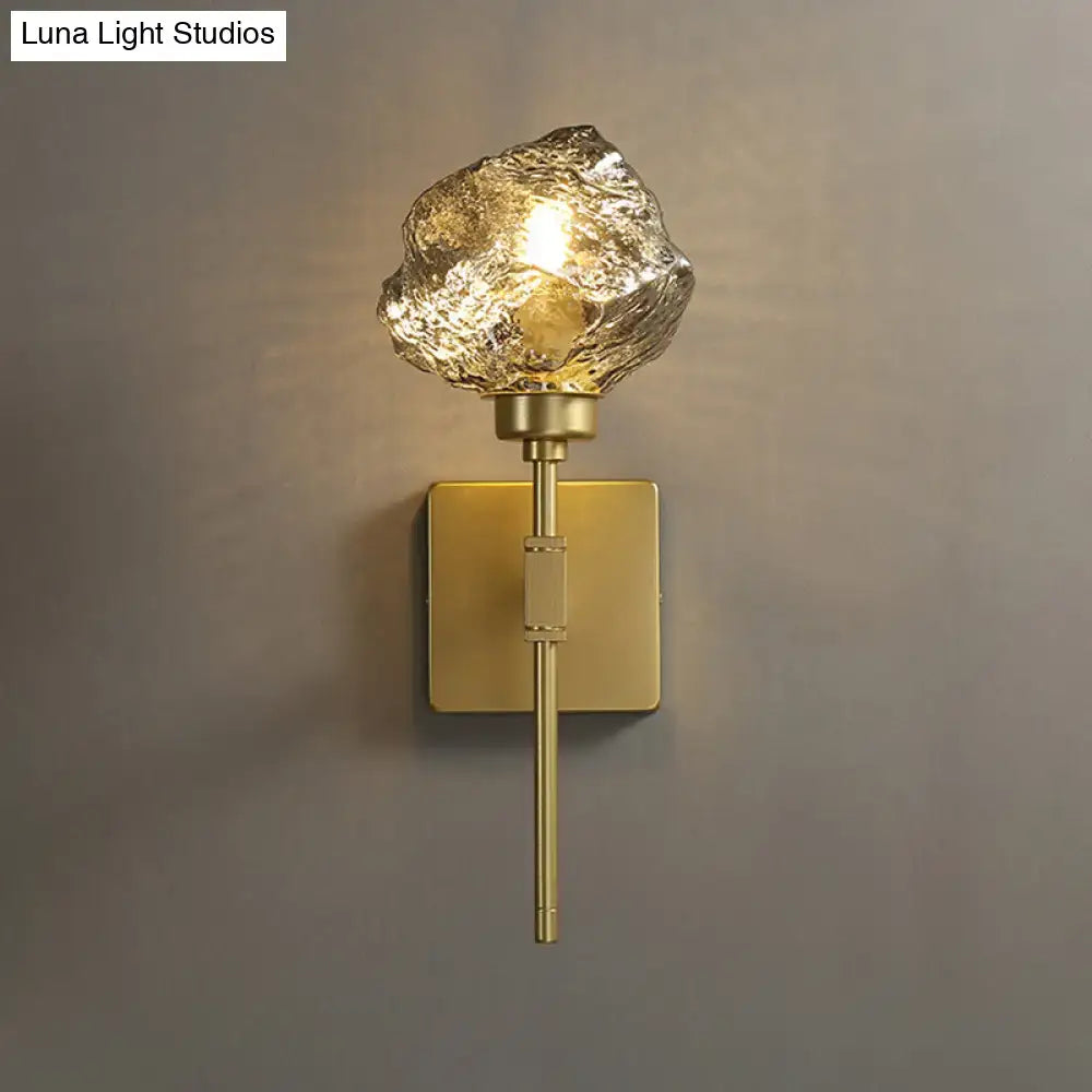 Post modern brass and amber glass wall light sconce living room