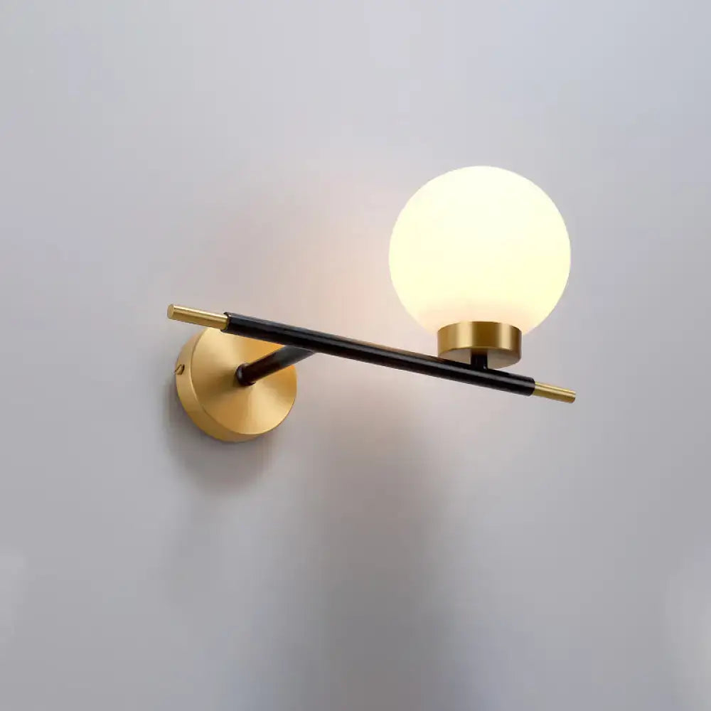 Post-modern white and brass sphere wall sconce bedroom light