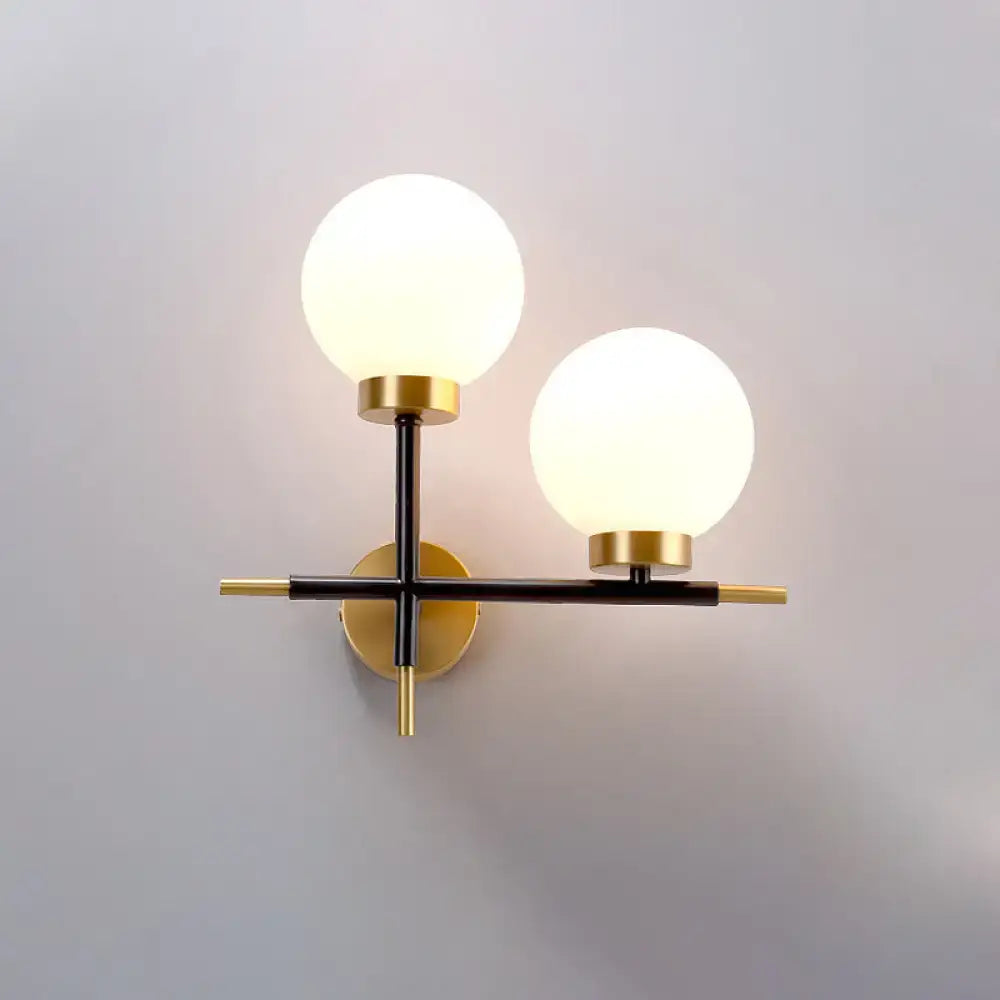Post-modern white and brass sphere wall sconce bedroom light