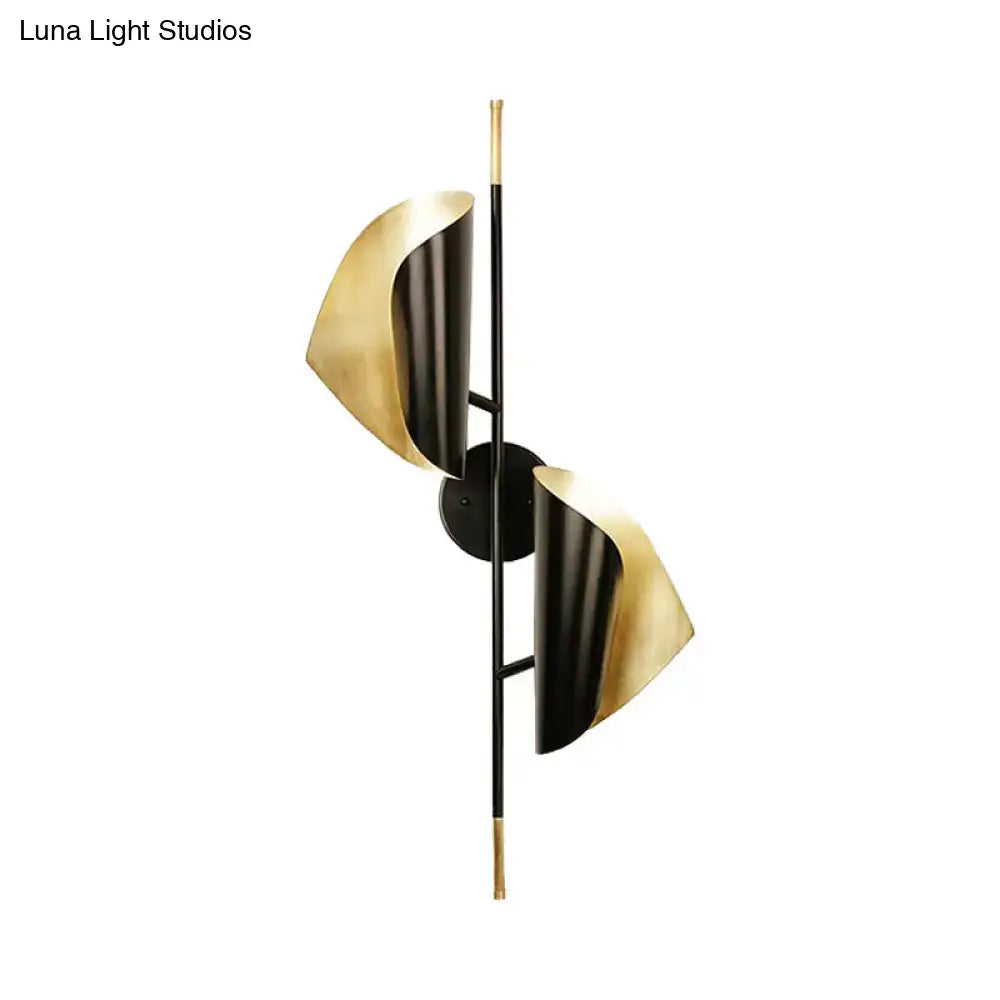 Postmodern black & gold ribbed leaf wall light for staircase