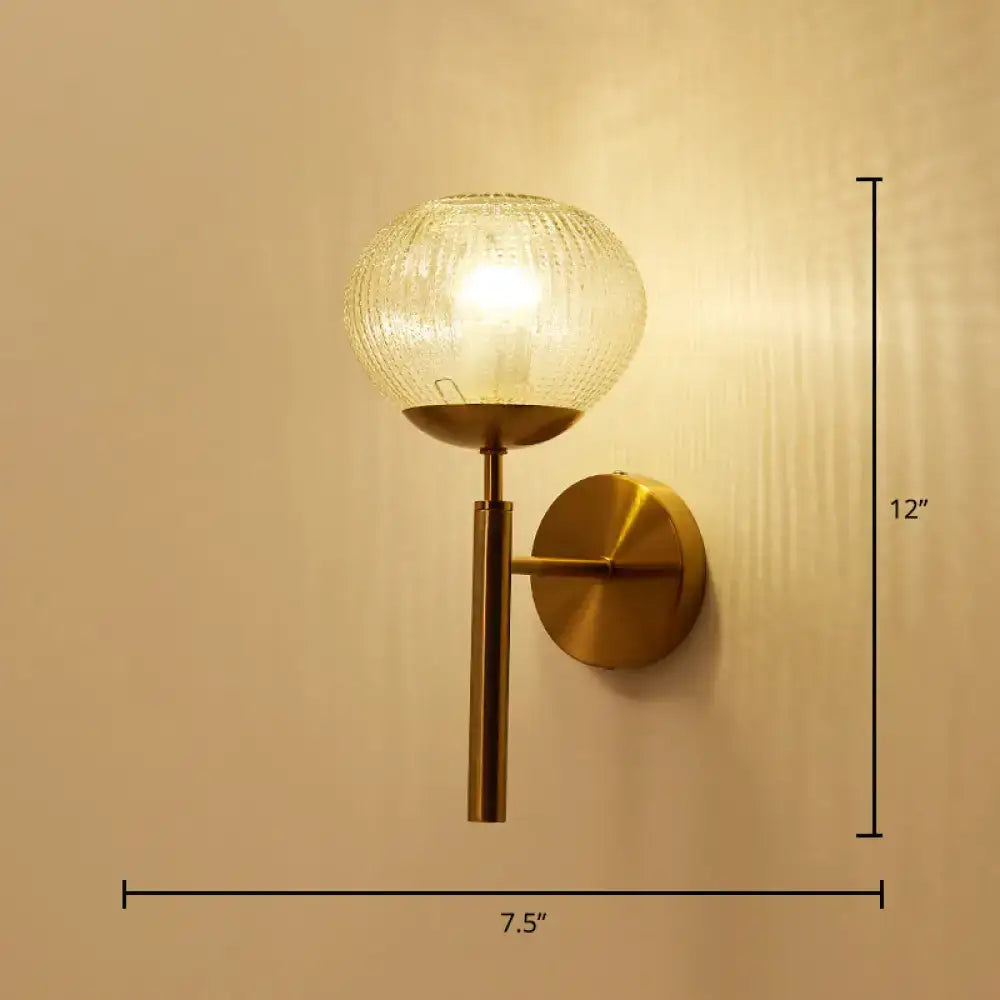 Postmodern gold ball shaped wall sconce with textured glass shade bedroom light