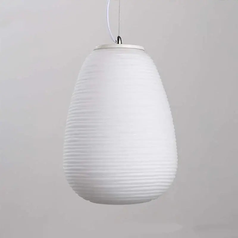 Ribbed off-white glass cocoon pendant light for dining room