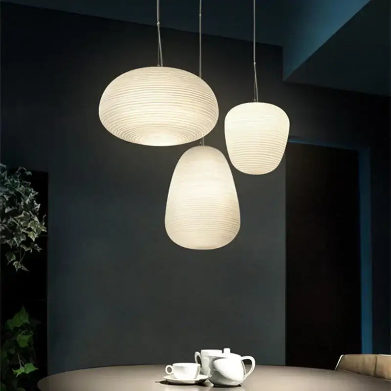 Ribbed off-white glass cocoon pendant light for dining room