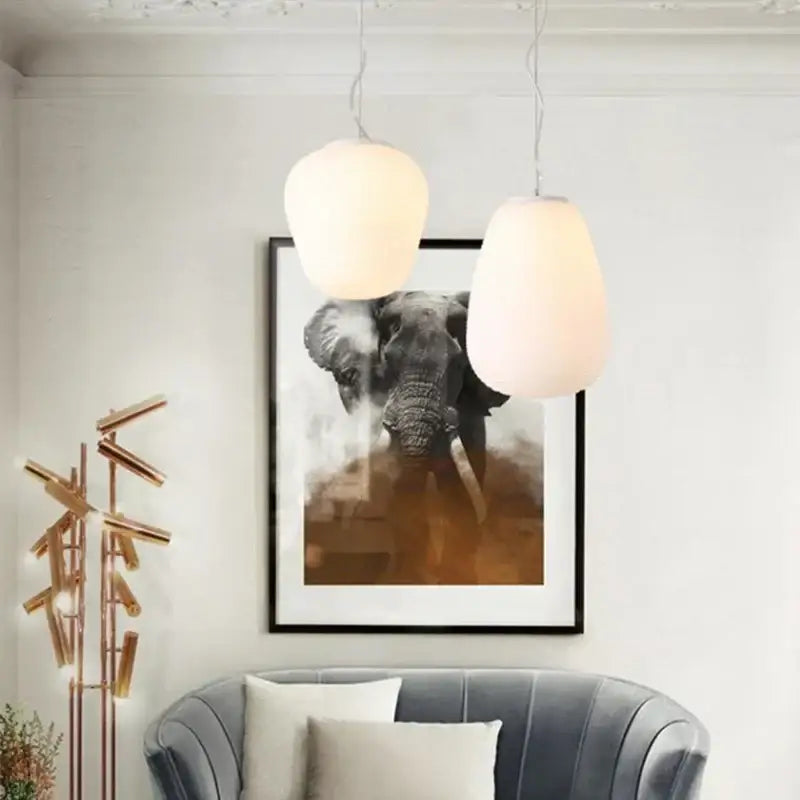 Ribbed off-white glass cocoon pendant light for dining room