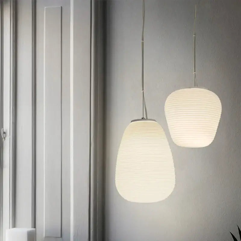 Ribbed off-white glass cocoon pendant light for dining room