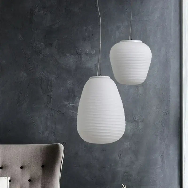 Ribbed off-white glass cocoon pendant light for dining room