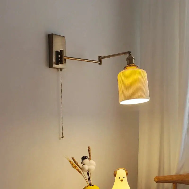 Ribbed yellow ceramic brass swing arm wall sconce bedroom light