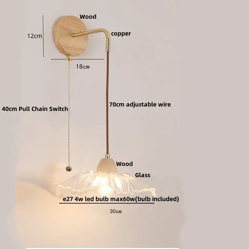 Rustic wood and brass wall light with clear glass pull chain switch
