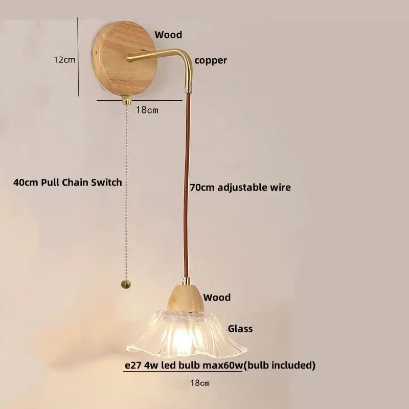 Rustic wood and brass wall light with clear glass pull chain switch