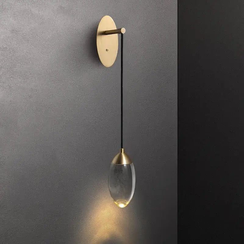Sleek brass and crystal led wall light for bedroom living room