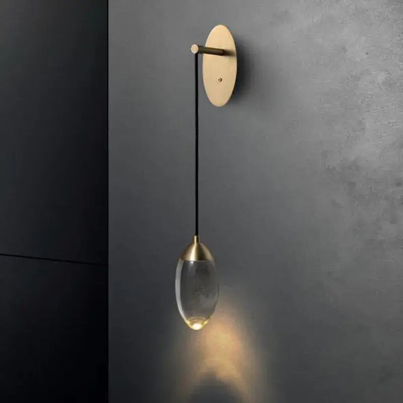 Sleek brass and crystal led wall light for bedroom living room