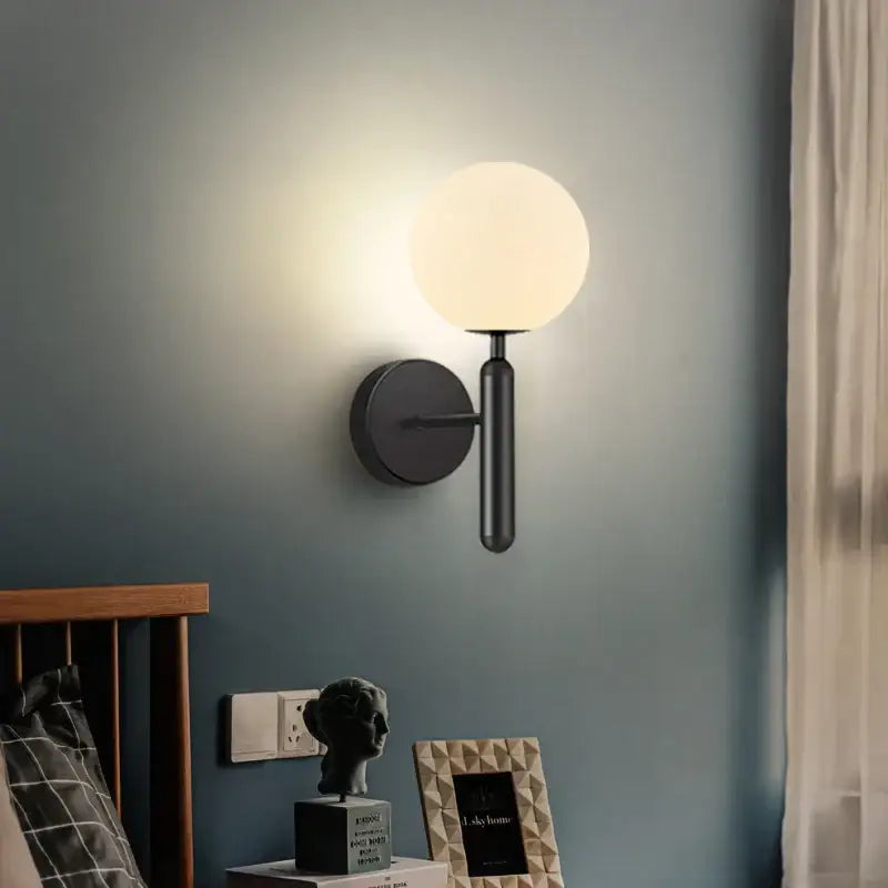 Sleek brass glass sphere wall sconce lamp – corridor lighting