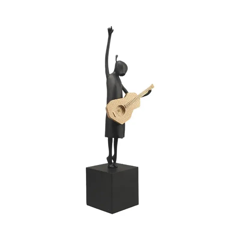 Stylized black and gold guitarist resin figure – living room decor