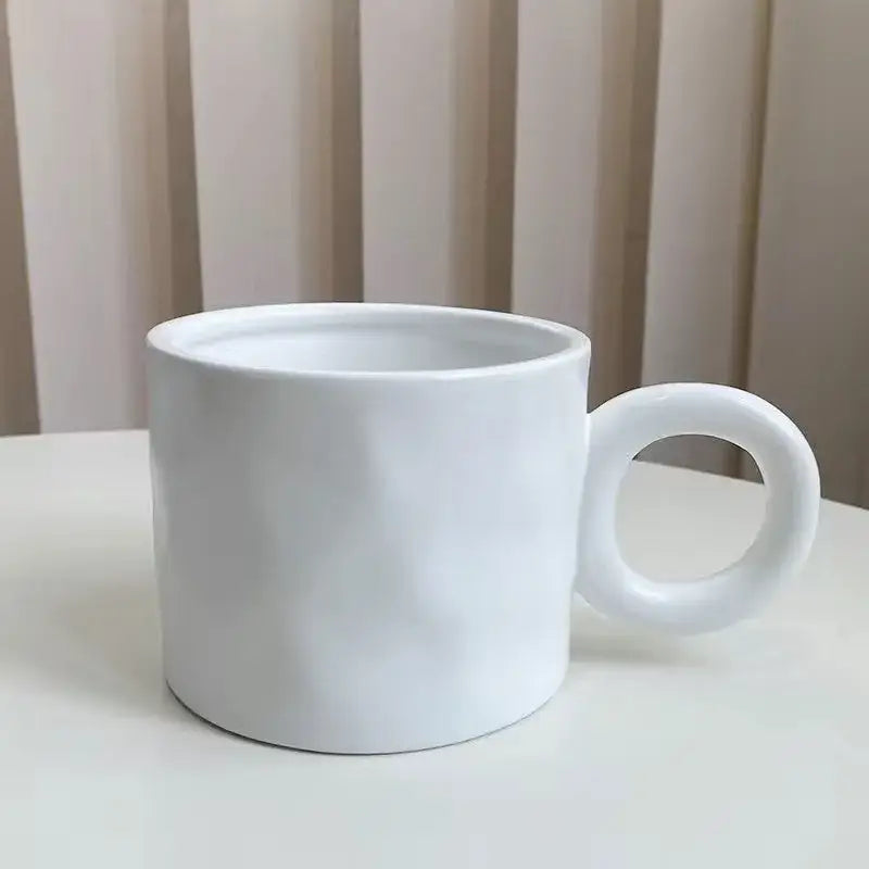Textured blue ceramic coffee mug kitchen cup with round handle