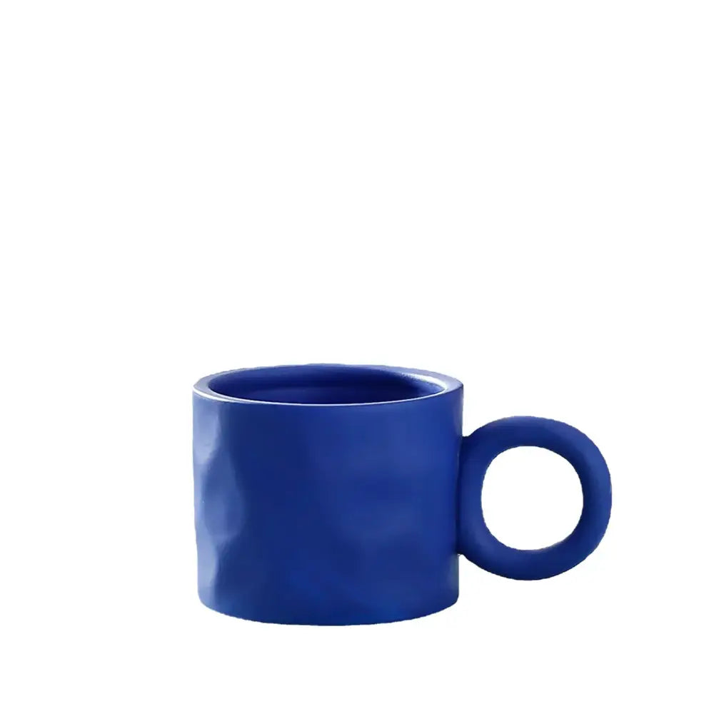 Textured blue ceramic coffee mug kitchen cup with round handle