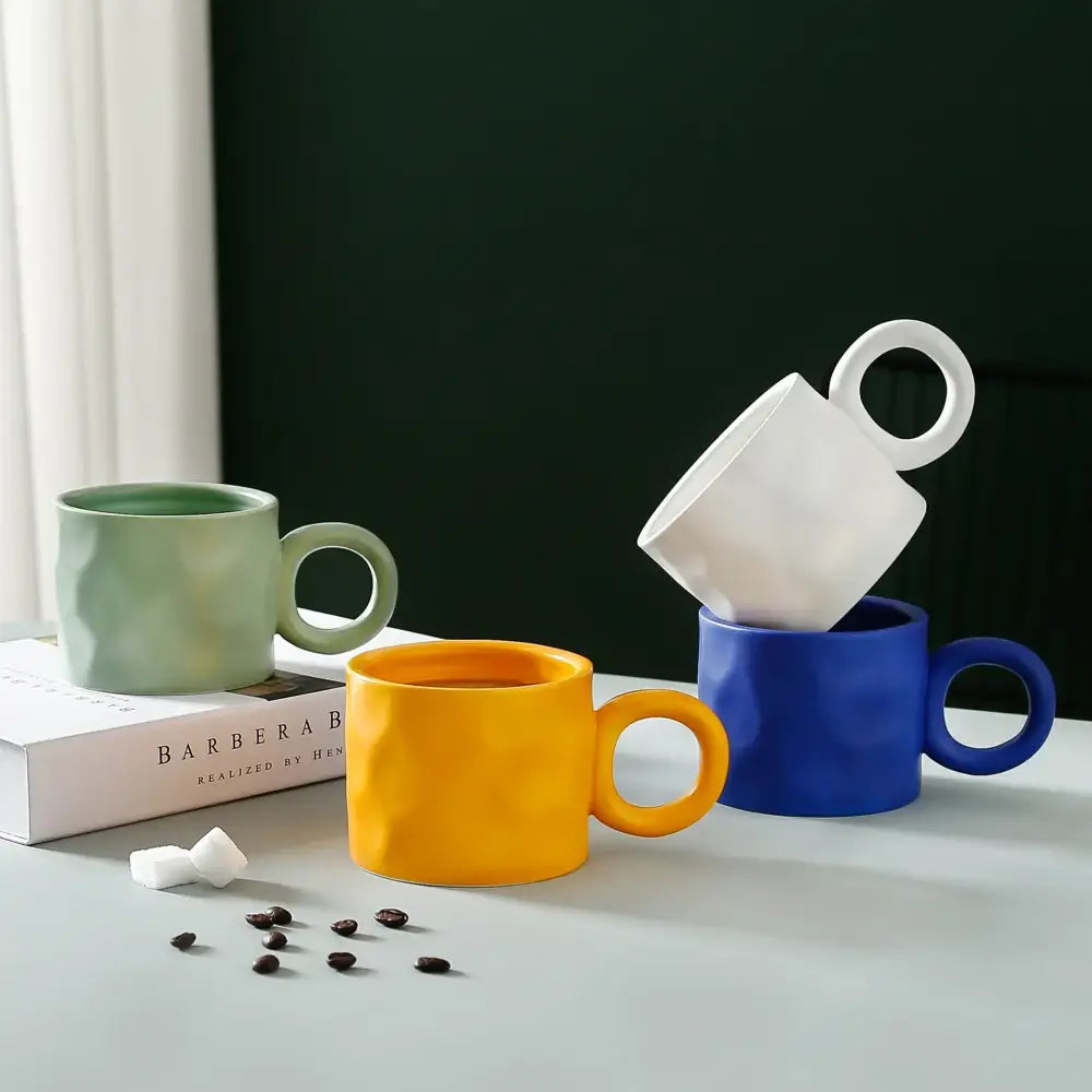 Textured blue ceramic coffee mug kitchen cup with round handle