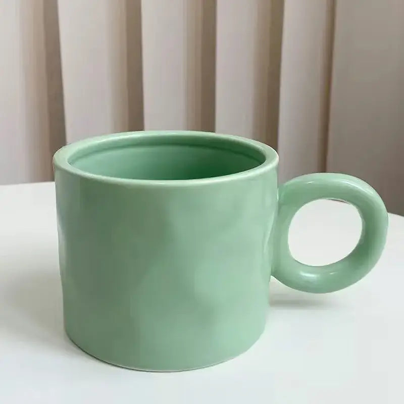 Textured blue ceramic coffee mug kitchen cup with round handle