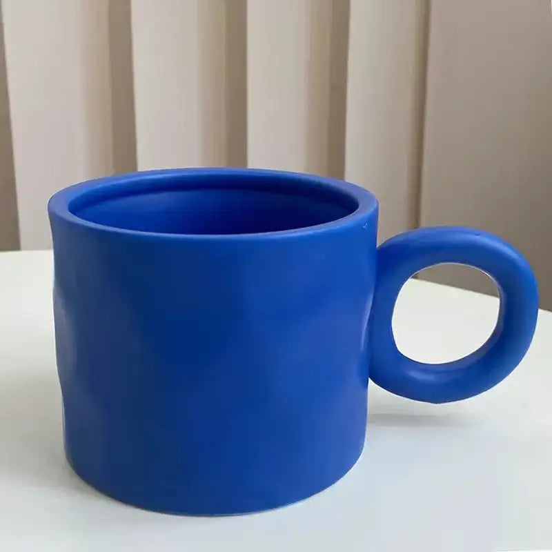 Textured blue ceramic coffee mug kitchen cup with round handle