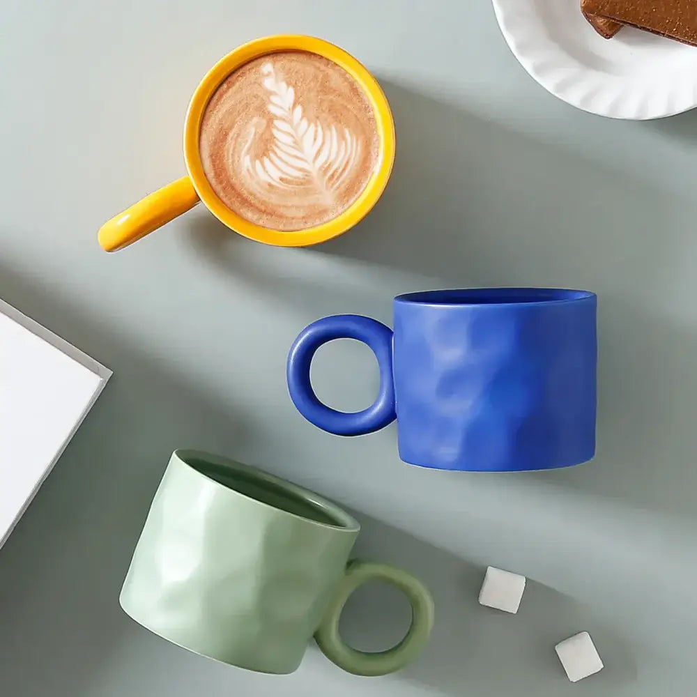 Textured blue ceramic coffee mug kitchen cup with round handle