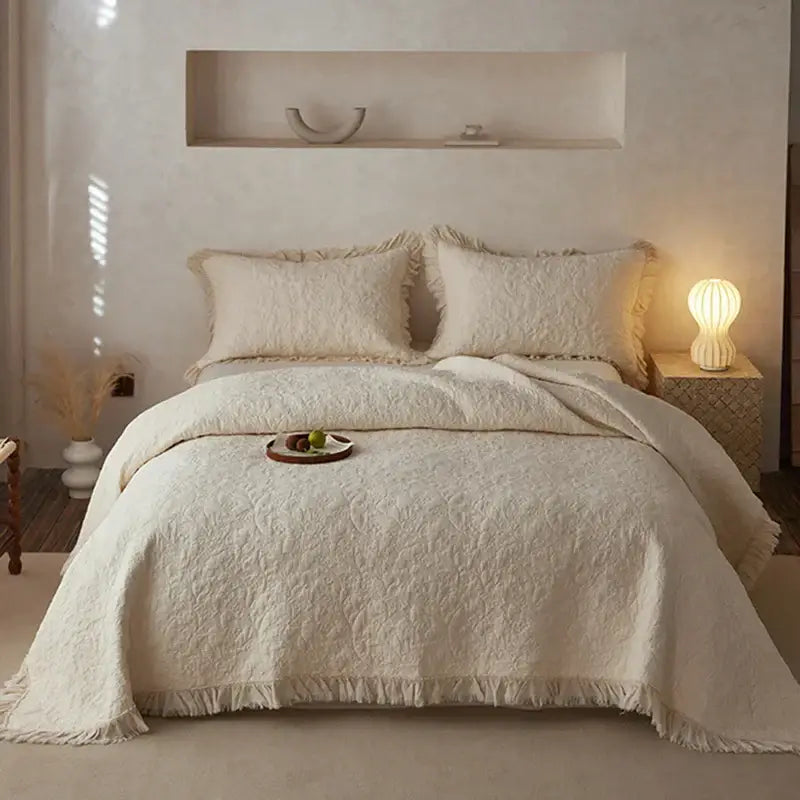 Textured cream cotton quilted bedspread set for bedroom with fringes