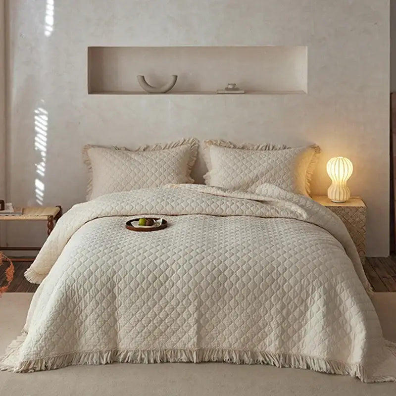 Textured cream cotton quilted bedspread set for bedroom with fringes