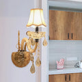 Traditional gold crystal wall sconce with fabric shade bedroom light