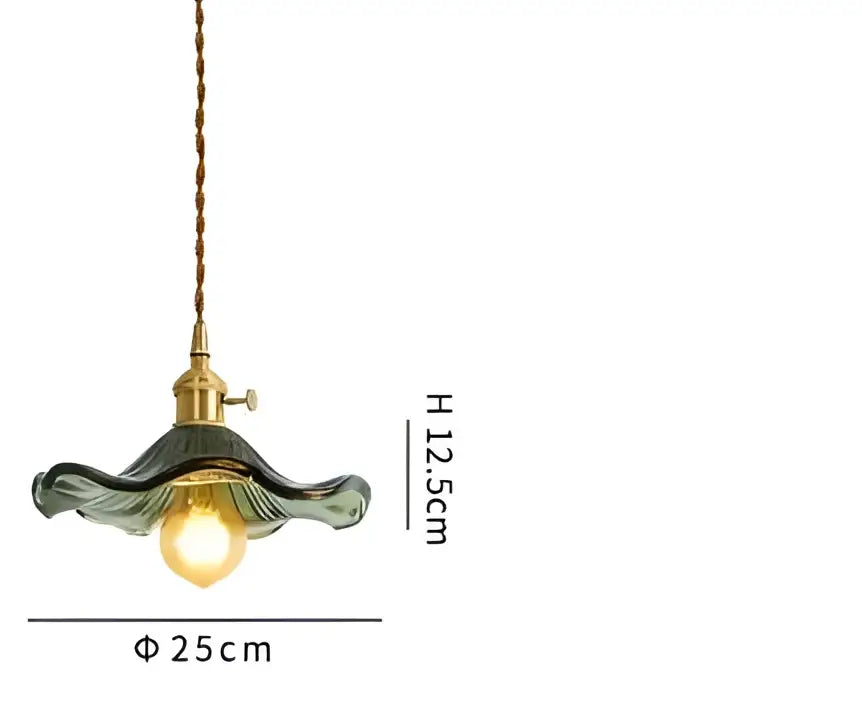 Translucent blue glass pendant light with brass fixture for dining room