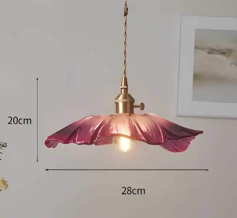 Translucent blue glass pendant light with brass fixture for dining room