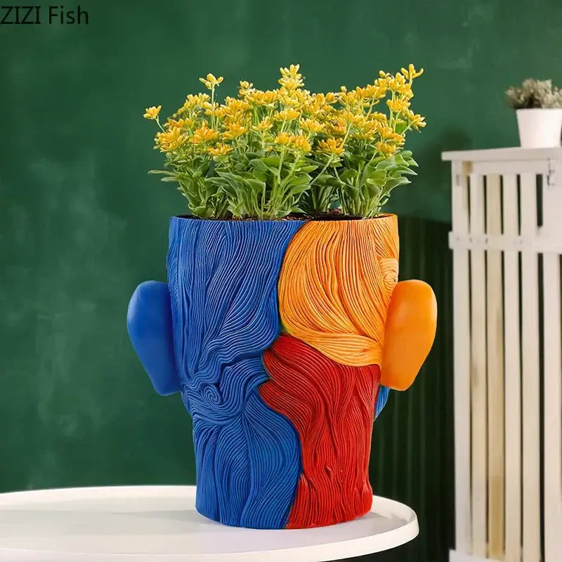 Vibrant human portrait resin vase with artificial flowers living room
