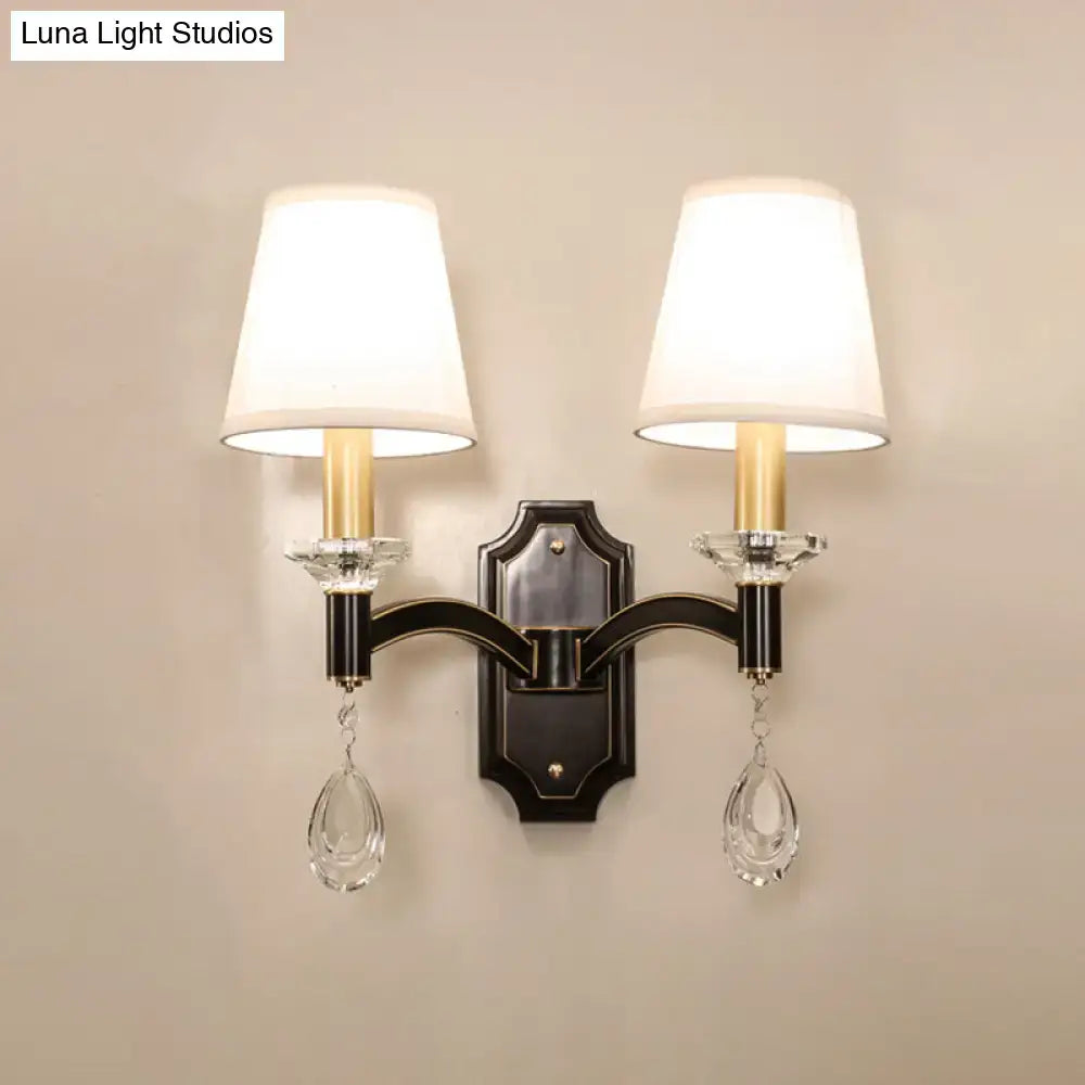 Vintage black metal wall lamp with cut crystal teardrop bedroom sconce