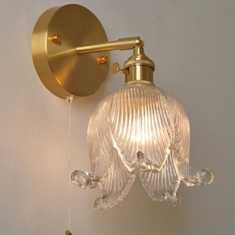 Vintage brass and amber glass wall light bedroom flower sconce