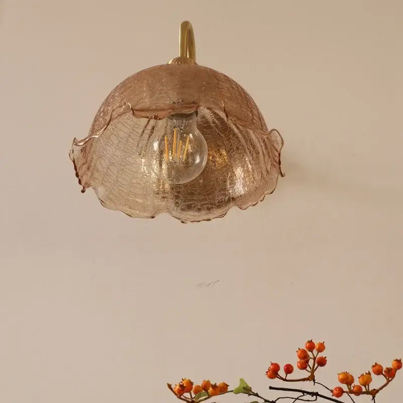Vintage brass and amber glass wall sconce bedroom vanity light