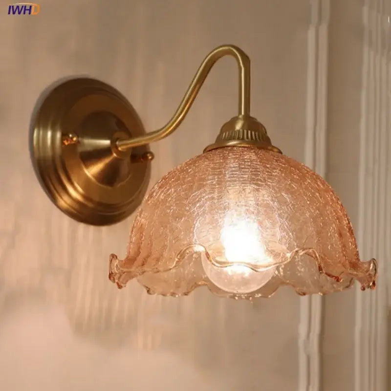 Vintage brass and amber glass wall sconce bedroom vanity light
