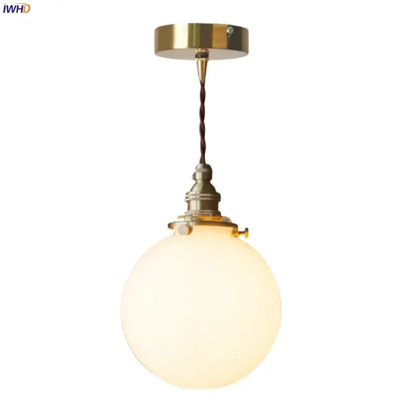 Vintage brass and cream glass ball pendant light for kitchen