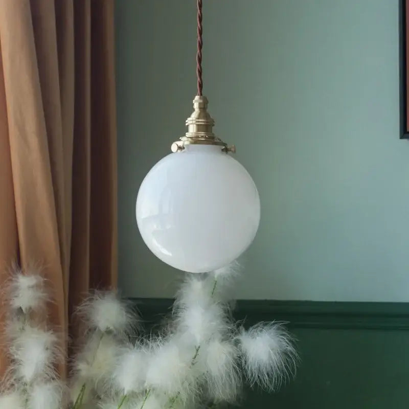 Vintage brass and cream glass ball pendant light for kitchen